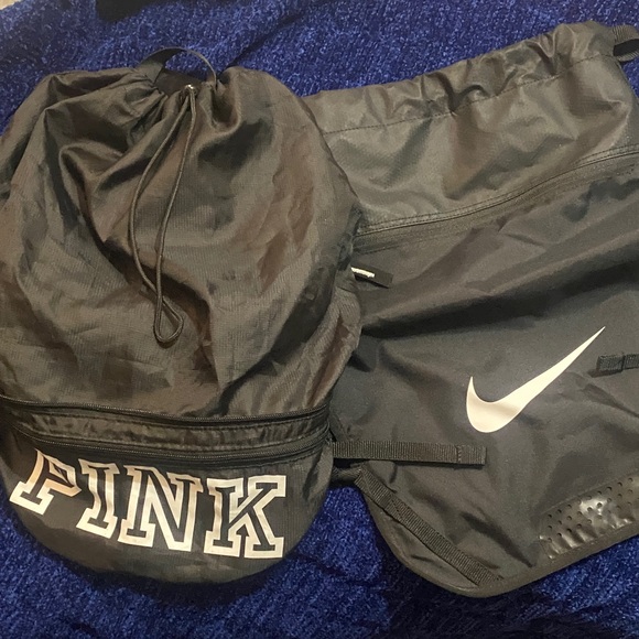 Nike Handbags - Nike Black and PINK White Logo Backpacks 2 for one deal